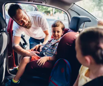 Dad with kids in car