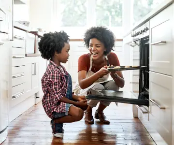 Mom cooking with child 