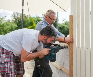 Two men doing home improvements